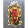 Sticker diable tiki rouge avec flammes jaunes
